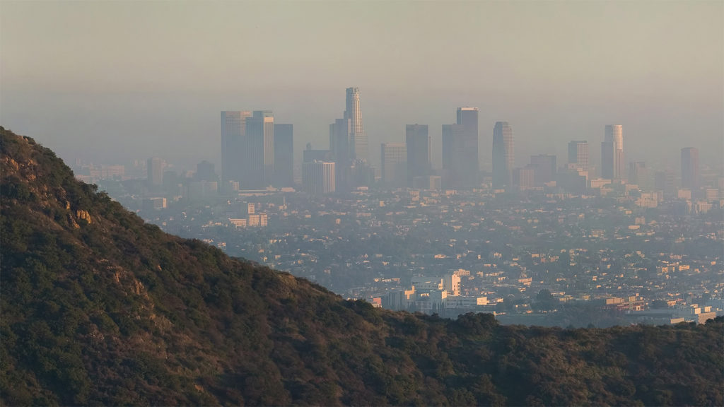 Prominent pollution in 2006 photo Los Angeles, as viewed from the Hollywood Hills, by Diliff (cropped); CC BY-SA 3.0; via Wikimedia Commons.