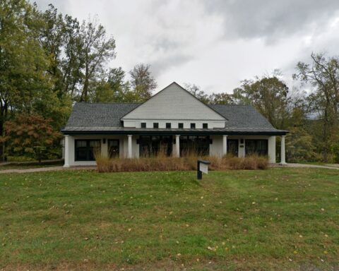 Photo of building housing the Berkshire Taconic Community Foundation headquarters, set behind a grassy front lawn about 100 feet deep/