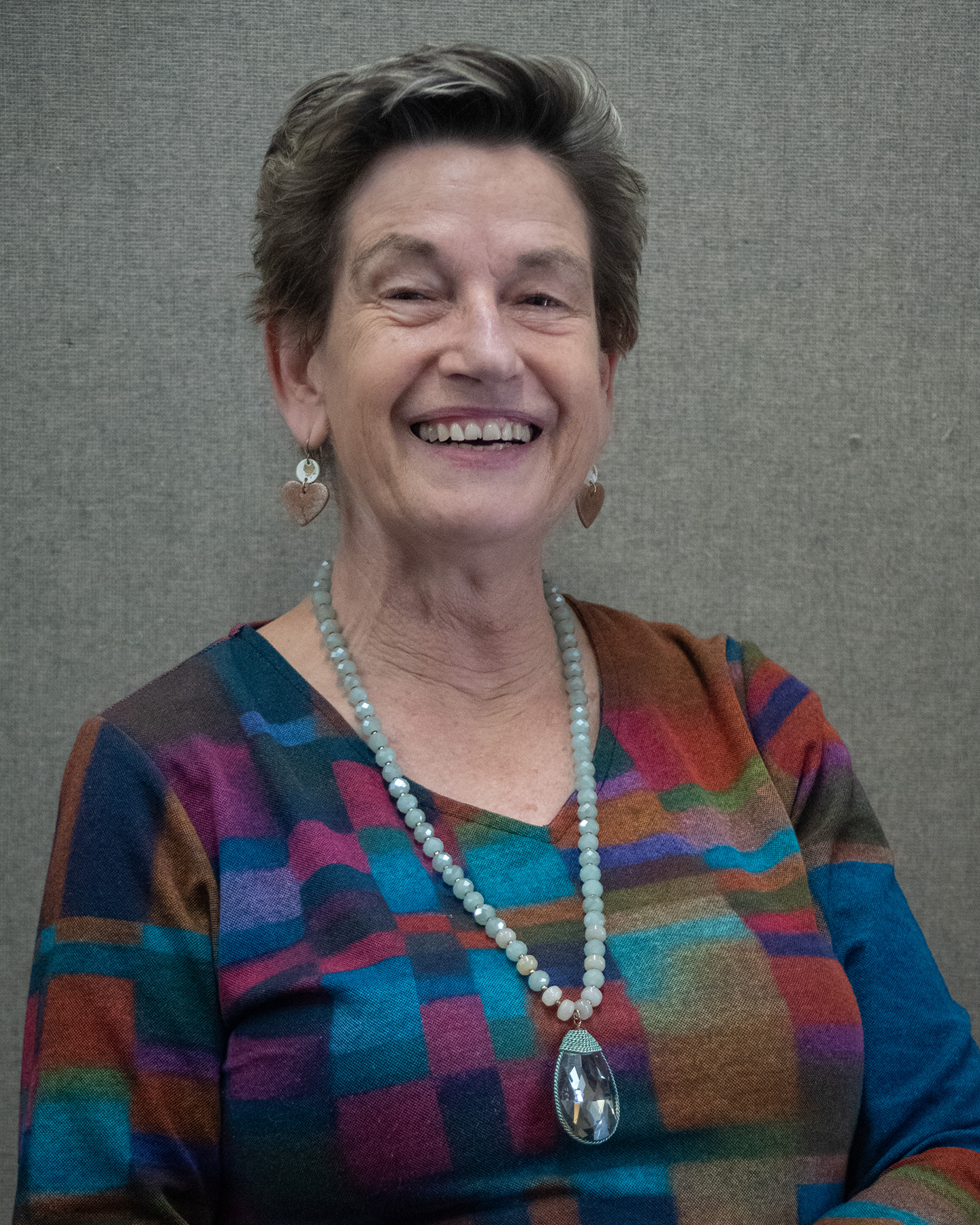 A smiling mature woman, Ute DeFarlo, Director of Development at Shakespeare & Company